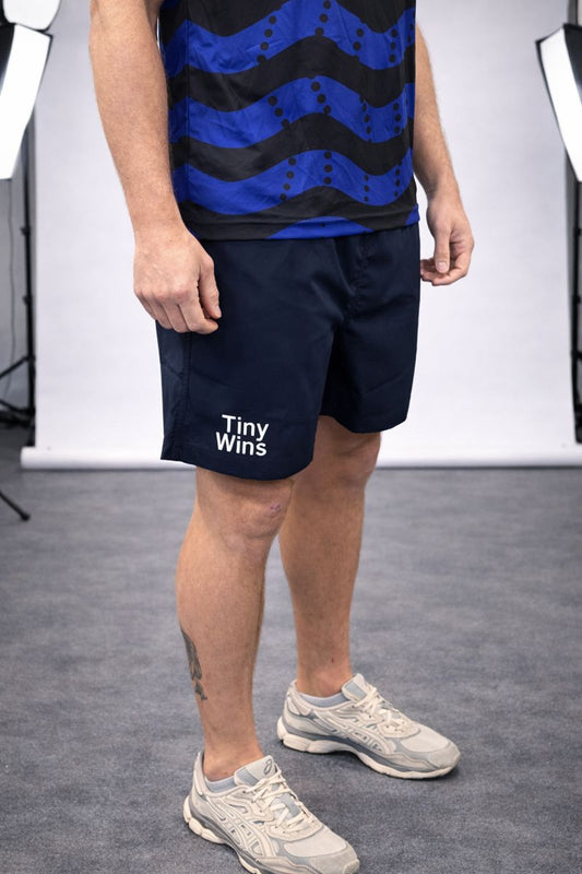 Tiny Wins Zipped Performance Shorts