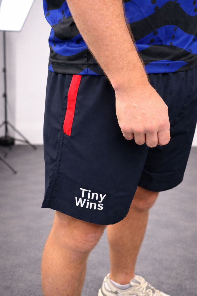 Tiny Wins Zipped Performance Shorts